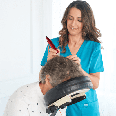 Doctor checking patient hair